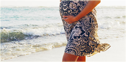 getty_rf_photo_of_pregnant_woman_beach